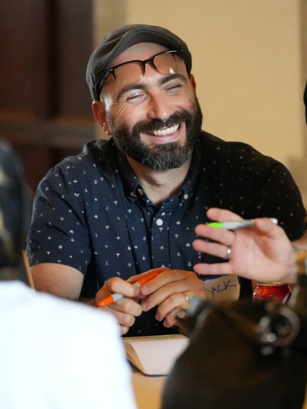 Man smiling in a circle